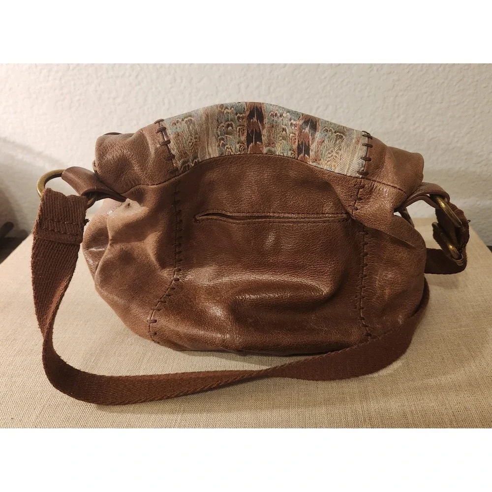 The Sak Deena Flap Foldover Brown Leather Crossbody Bag with Studs Feather Print